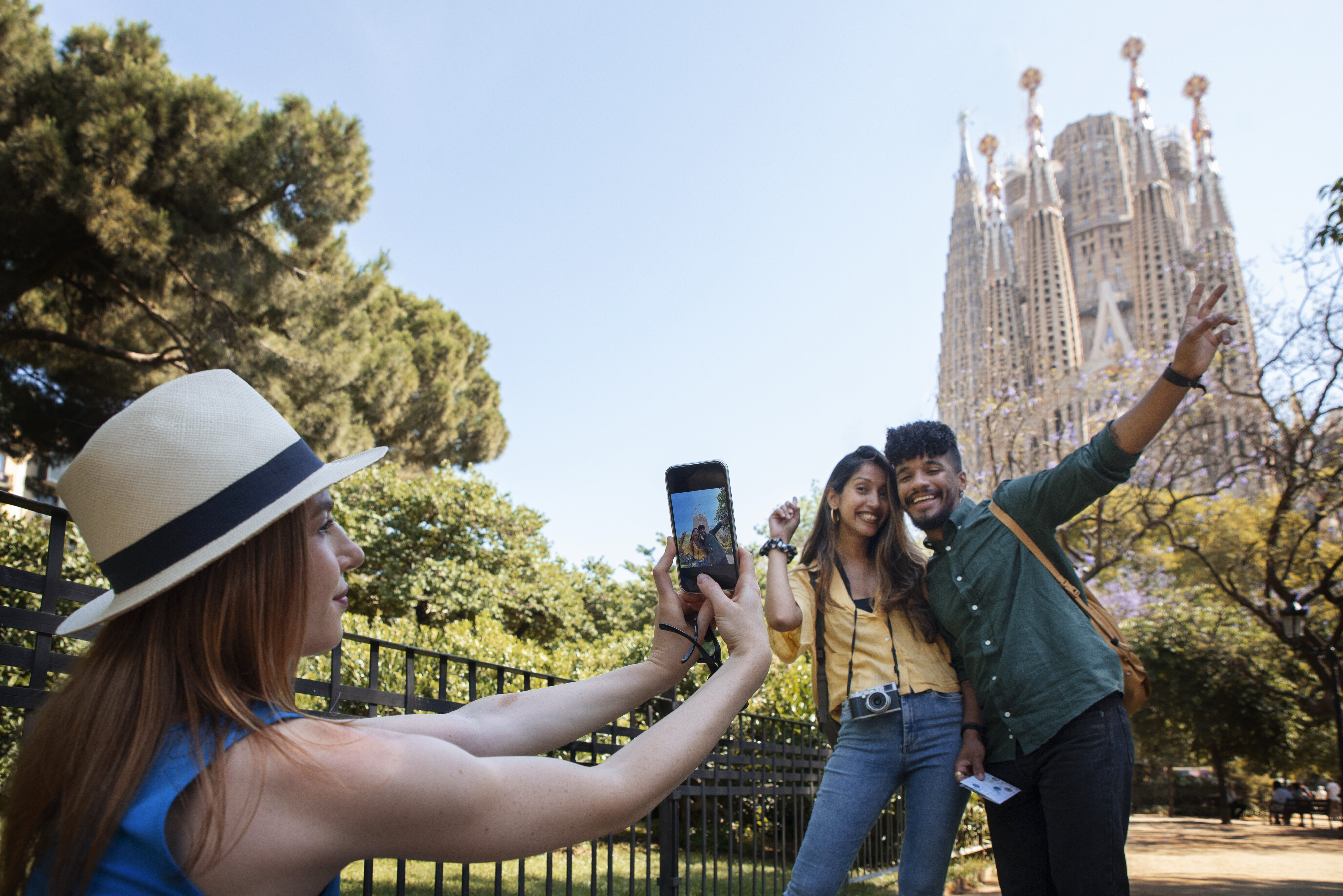 side-view-woman-taking-photos-with-phone
